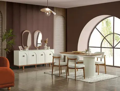 White dining table and chair set with matching sideboard in a modern brown-toned dining room.