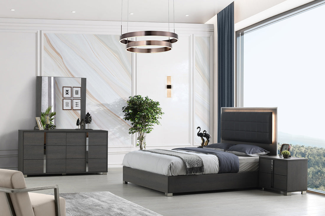 Gray modern bedroom set with LED headboard, dresser, and marble accent wall