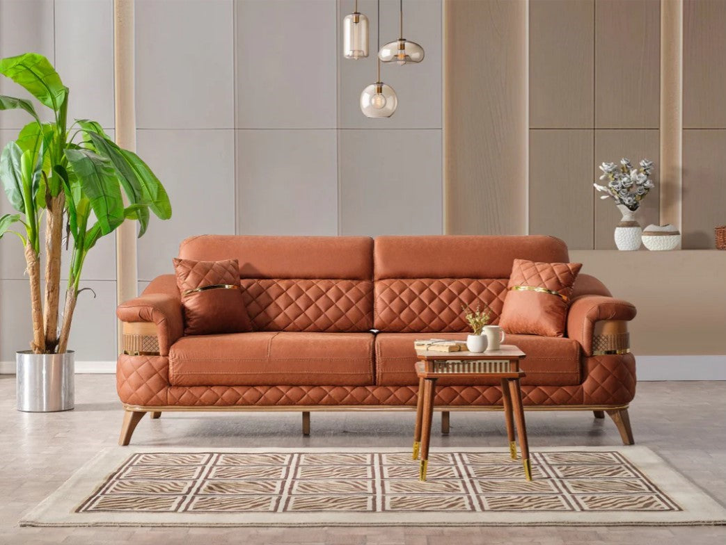 Terracotta leather-look sofa with diamond-quilted back and wood legs in a modern living room